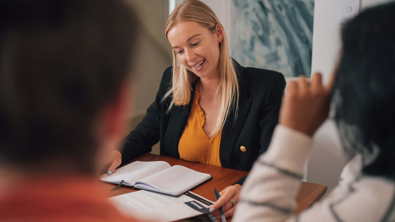 Agent talking with buyers