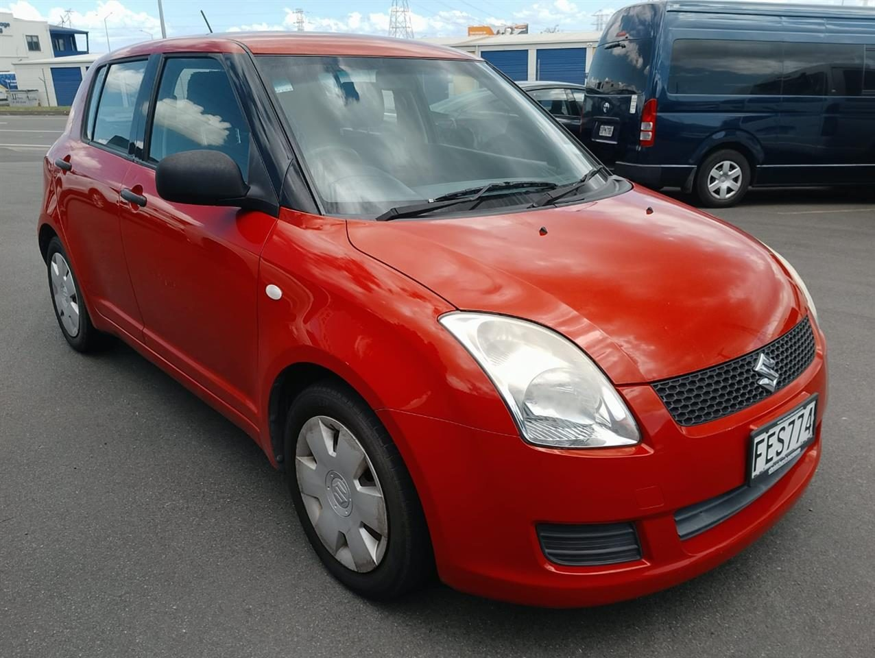 Red Suzuki Swift