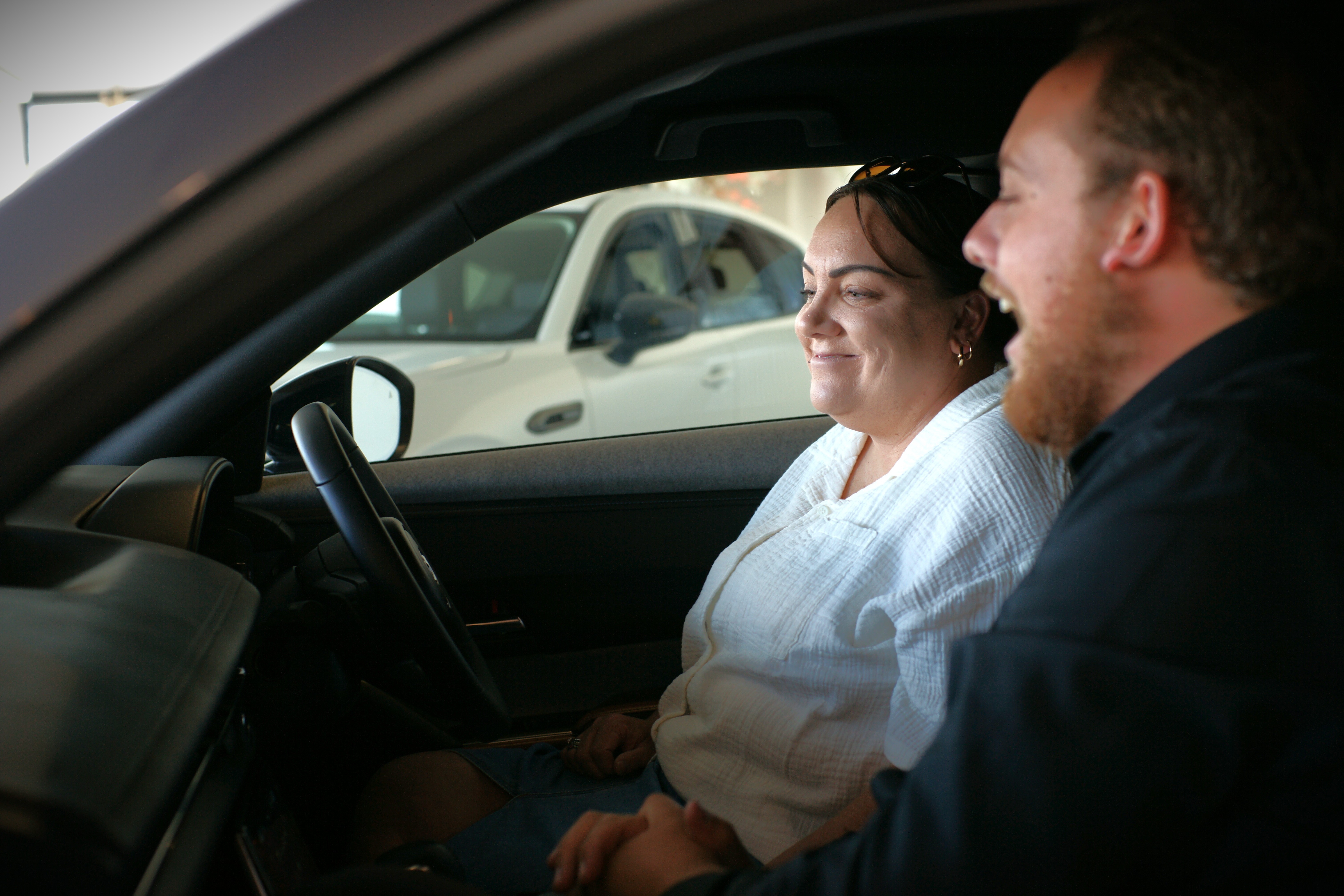 Andra learning all about her new vehicle