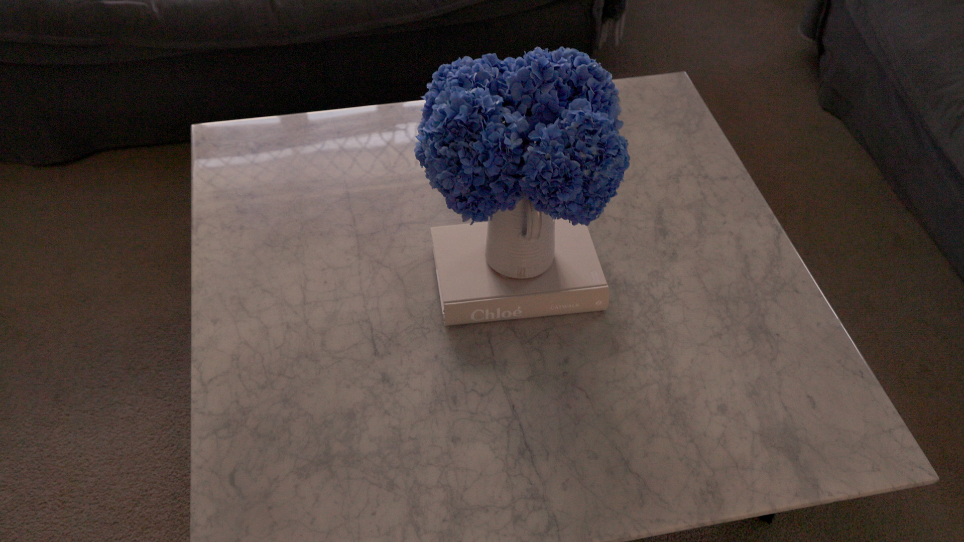 Marble coffee table in the centre of the lounge.