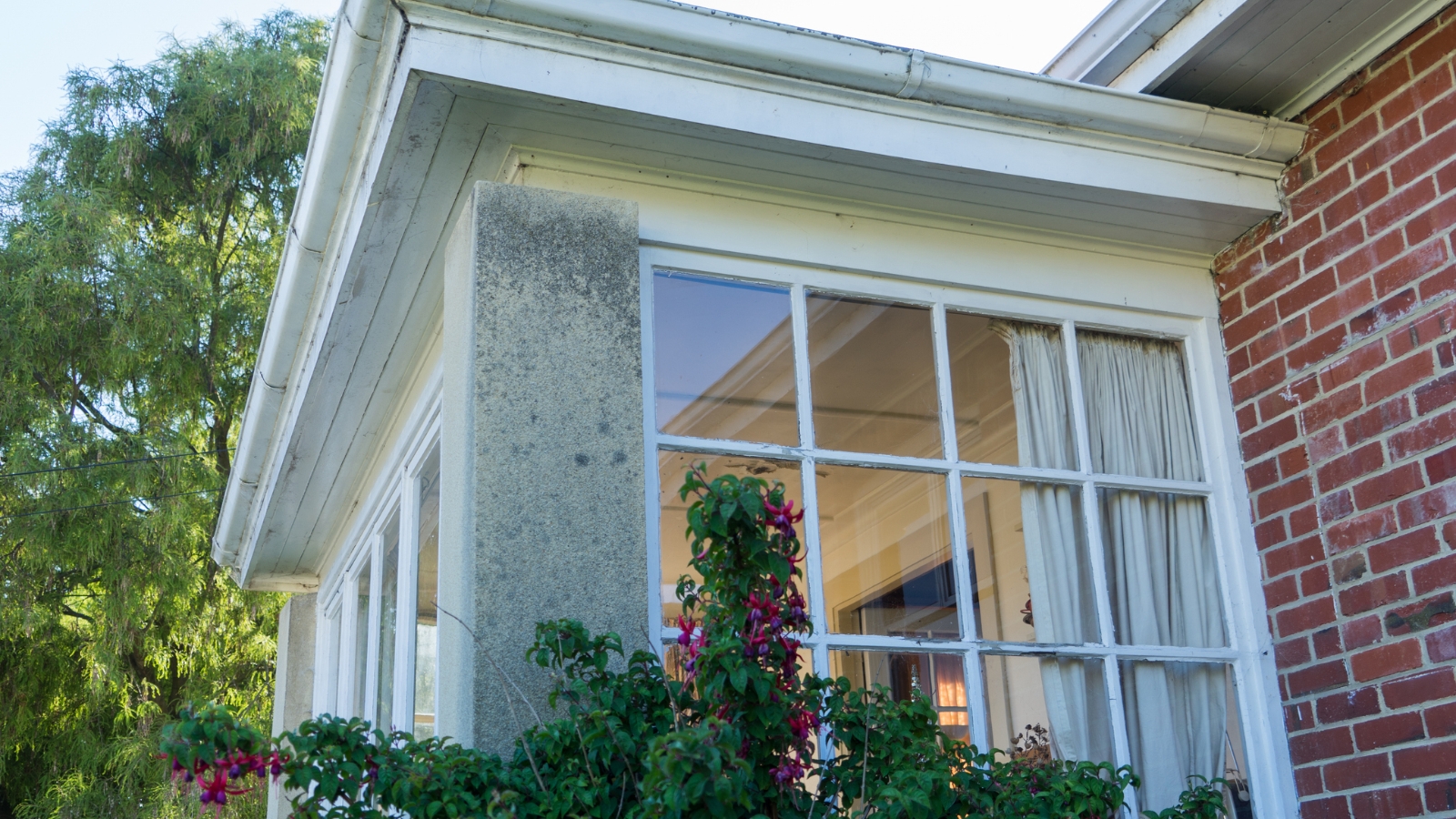 Image of old brick houses window.