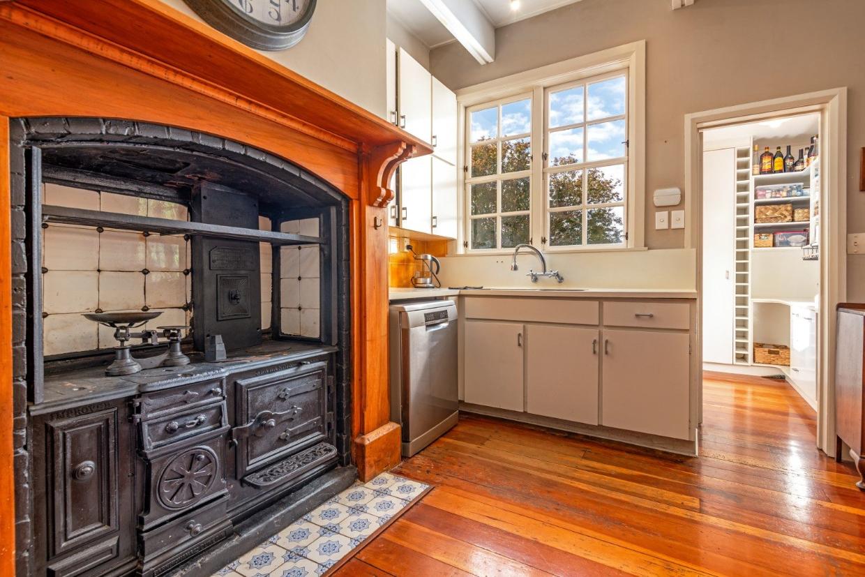 The original cooking range remains in place in the kitchen.