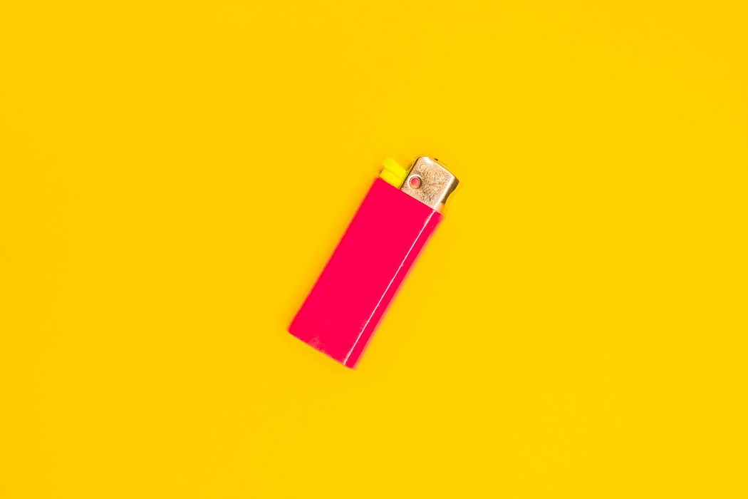 A red cigarette lighter