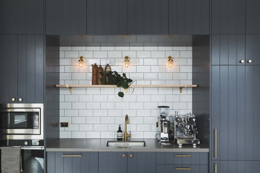 Dark kitchen with hanging lights