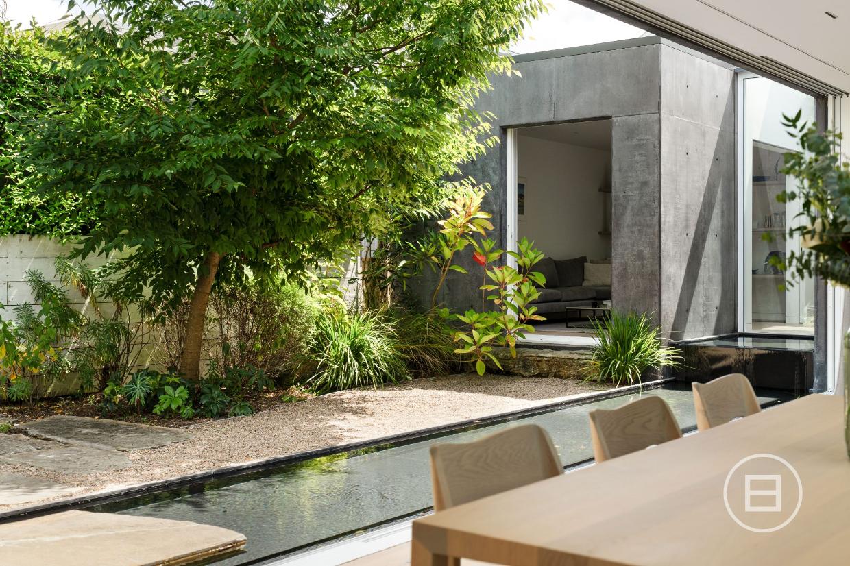 The concrete pod accommodates a second living area or media room.