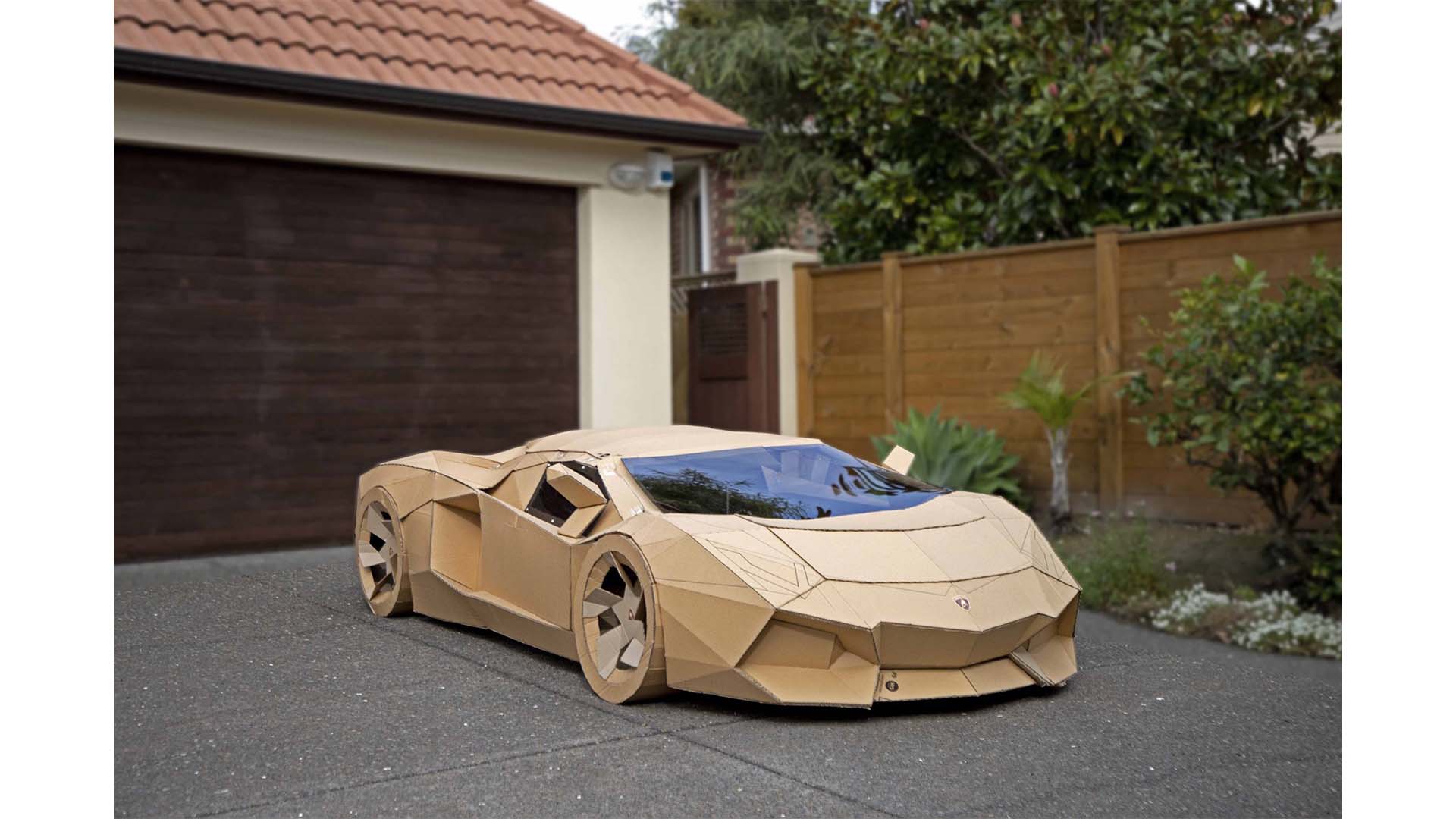 A cardboard Lamborghini Aventador crafted by David from Auckland, sold for charity on Trade Me, fetching $10,420.
