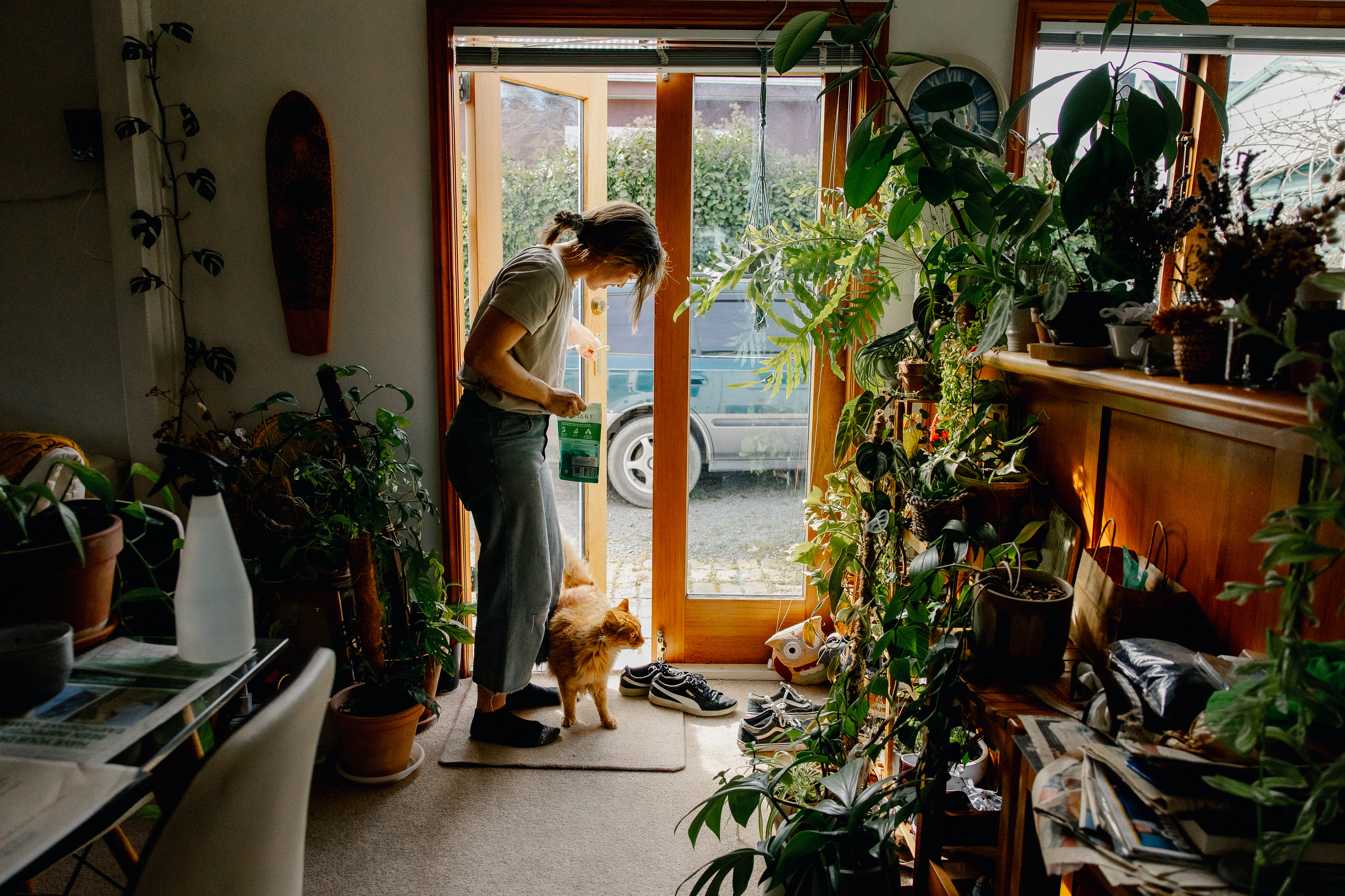 Elissa and her cat at the door