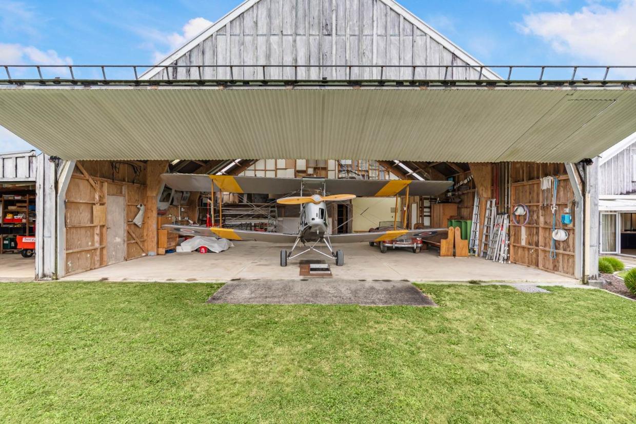 Massive door opening out to the garden from the garage