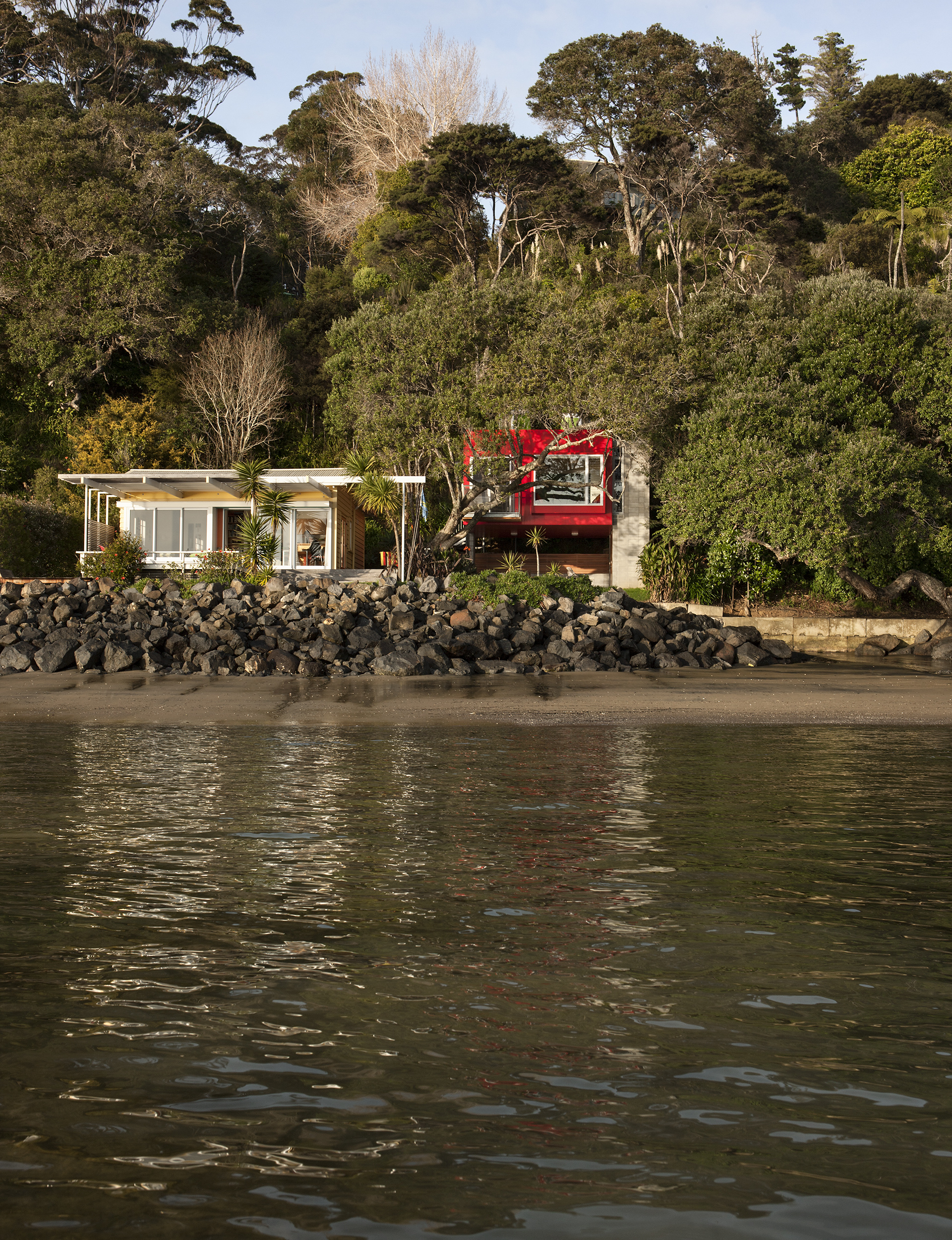 External shot of the homes from the water