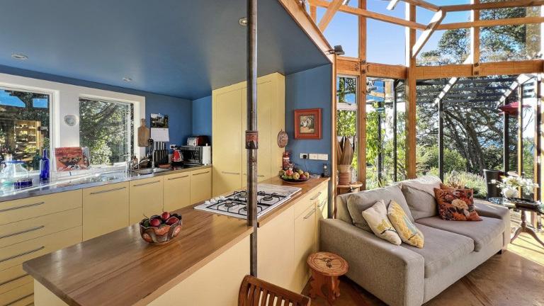 The kitchen is just off the main living area. Photo: RAY WHITE/TRADE ME
