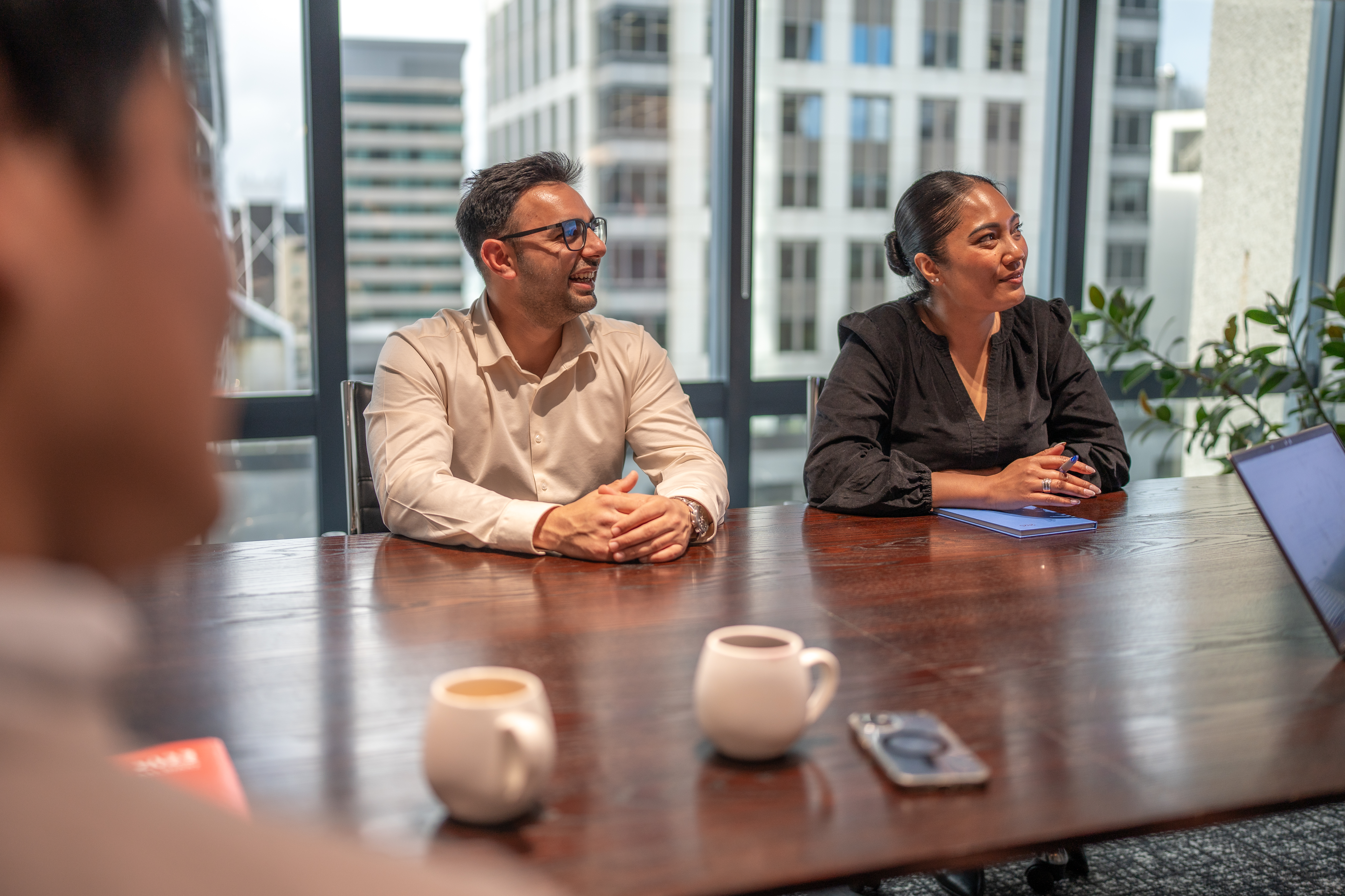 Worker in a meeting with their manager.