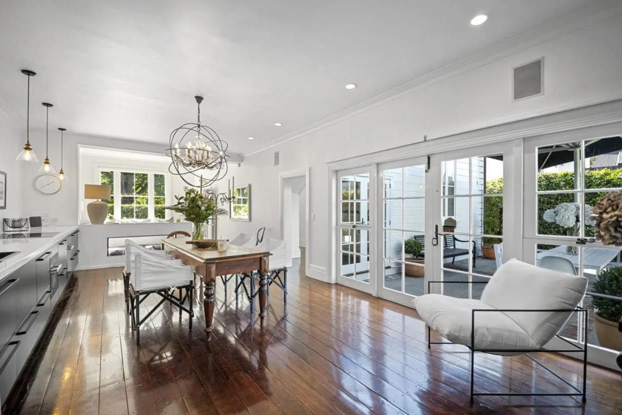 The current owner, who restored the house, opted for a long, galley-style kitchen in the family living area, which opens to a courtyard.
