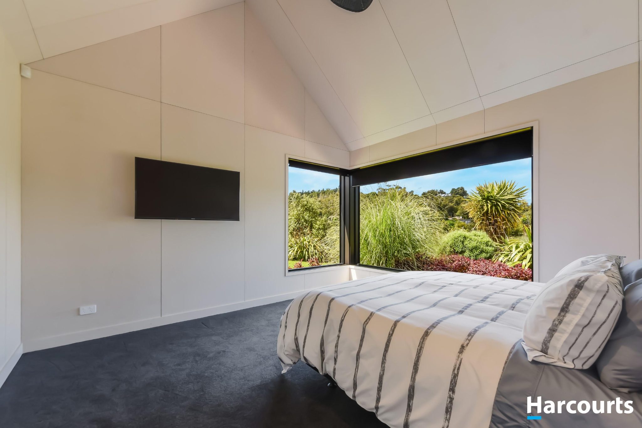 The bedroom overlooking the lush Kaiteriteri greenery