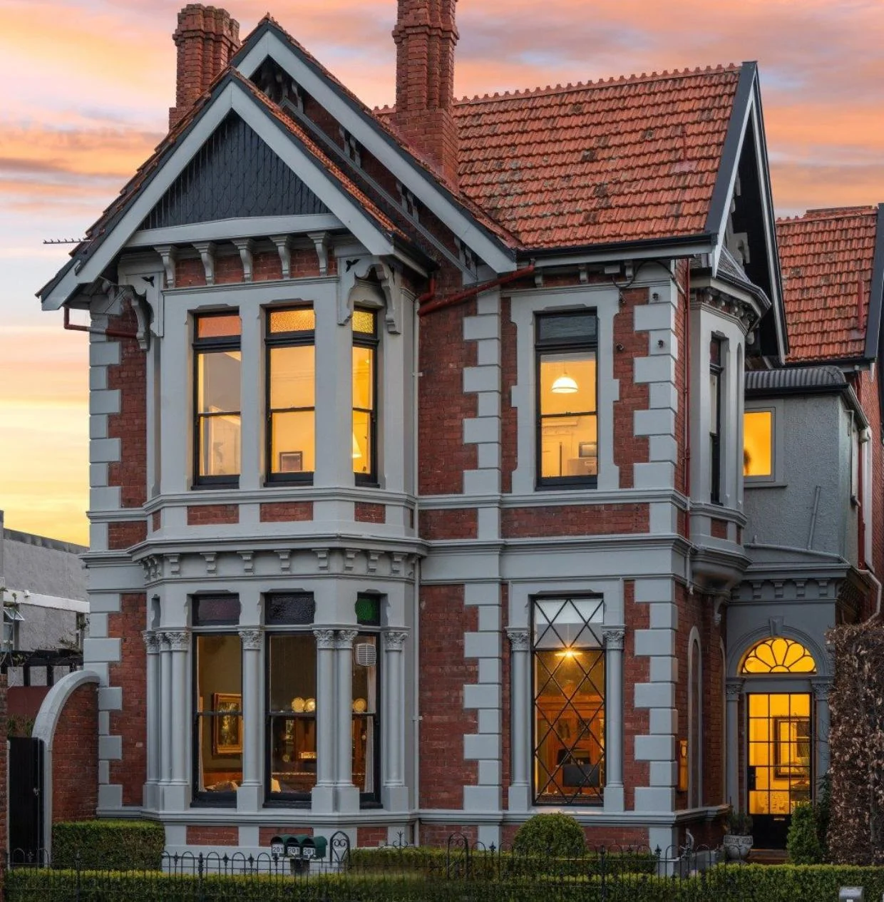 The house has a twin-gable roof construction.