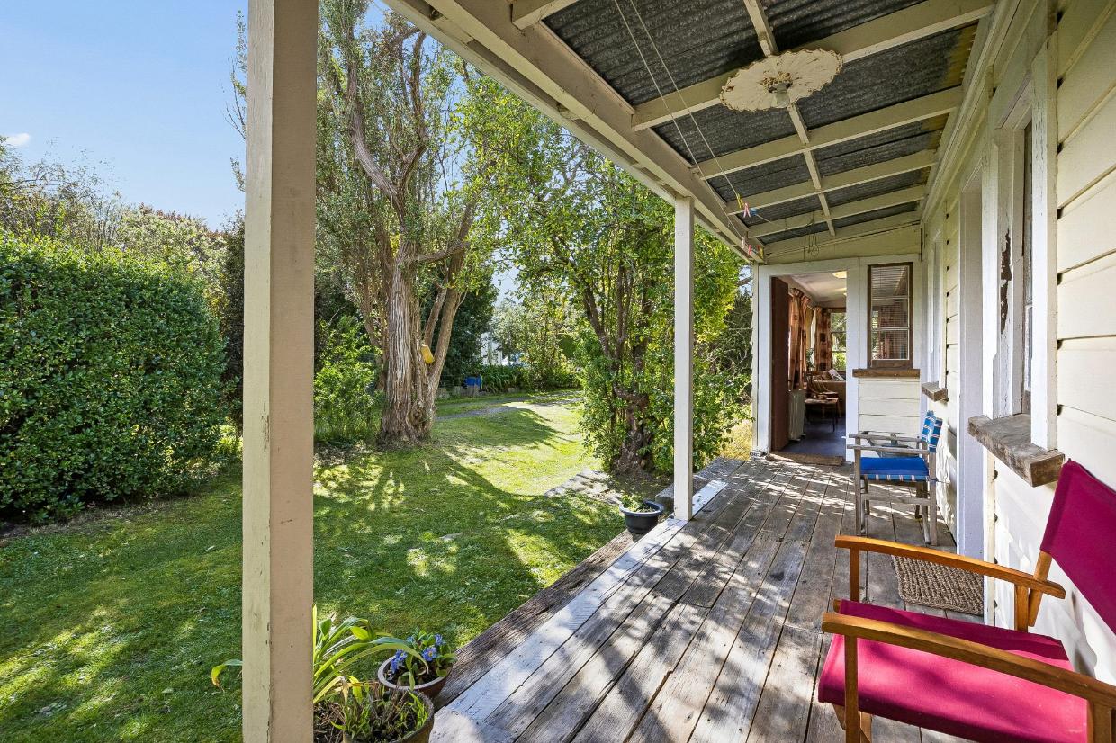Innumerable weekends and summer holidays have been spent lazing on the veranda and playing games outside. Photo: Nidd Realty