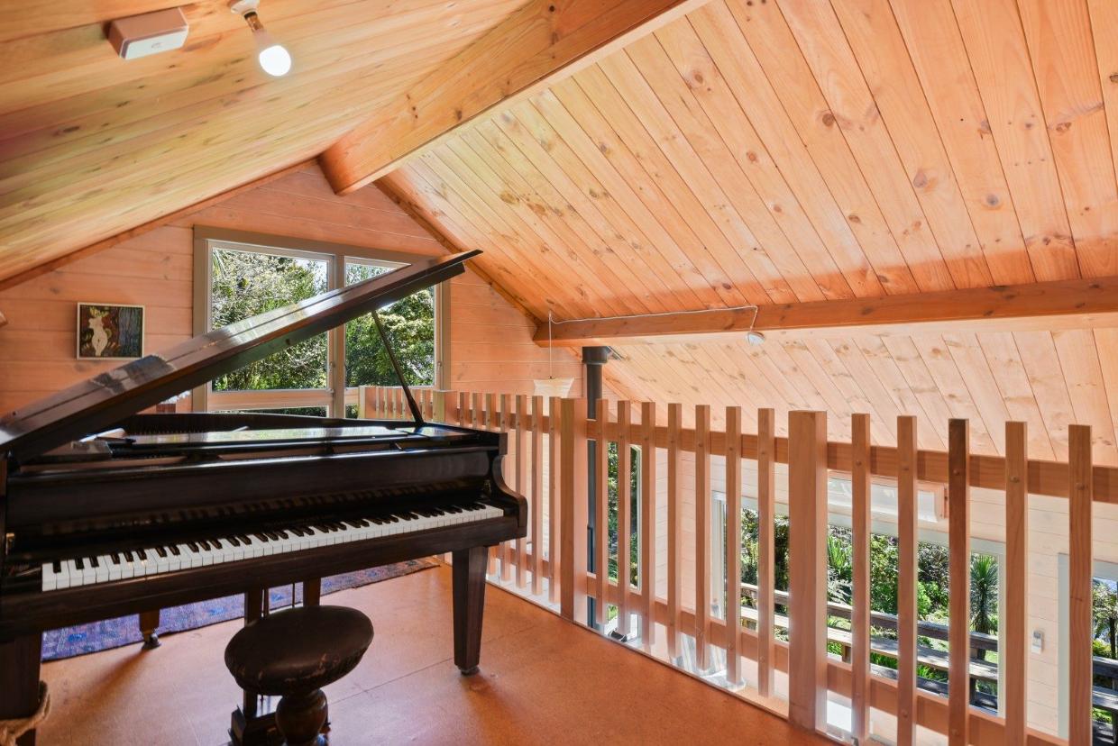 273J Whangamoa Drive, Rotoiti, Rotorua. And yes, that is a grand piano.