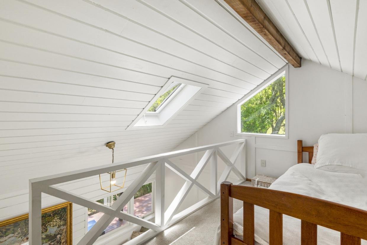 A cozy bedroom on the mezzanine