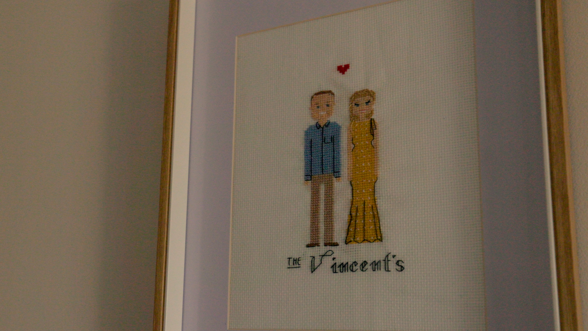 A crochet portrait of the owners.