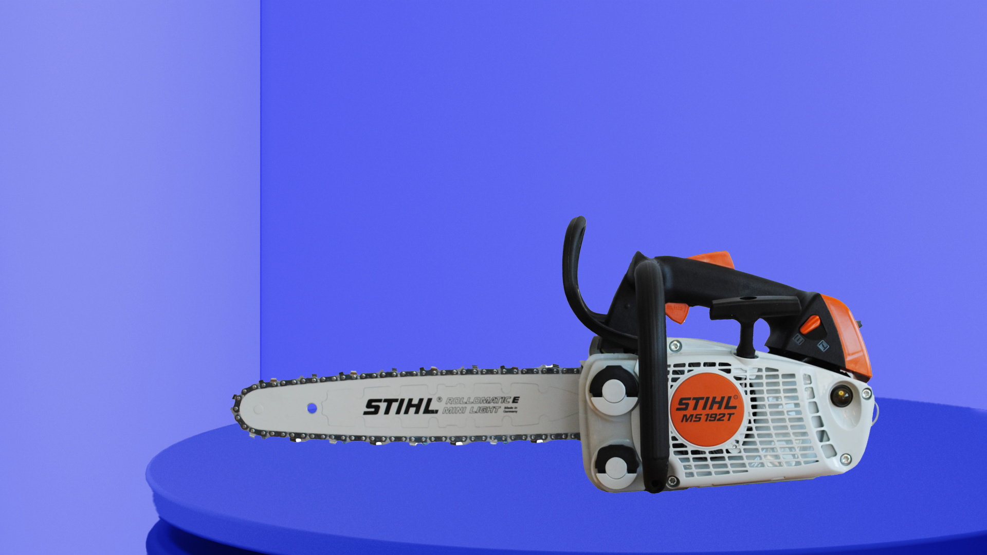 Image of a chainsaw (with a chain brake) on a red background.