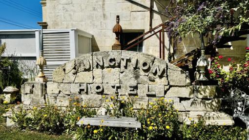 The original pediment is now a stone garden feature. Photo: TRADE ME/ONE AGENCY