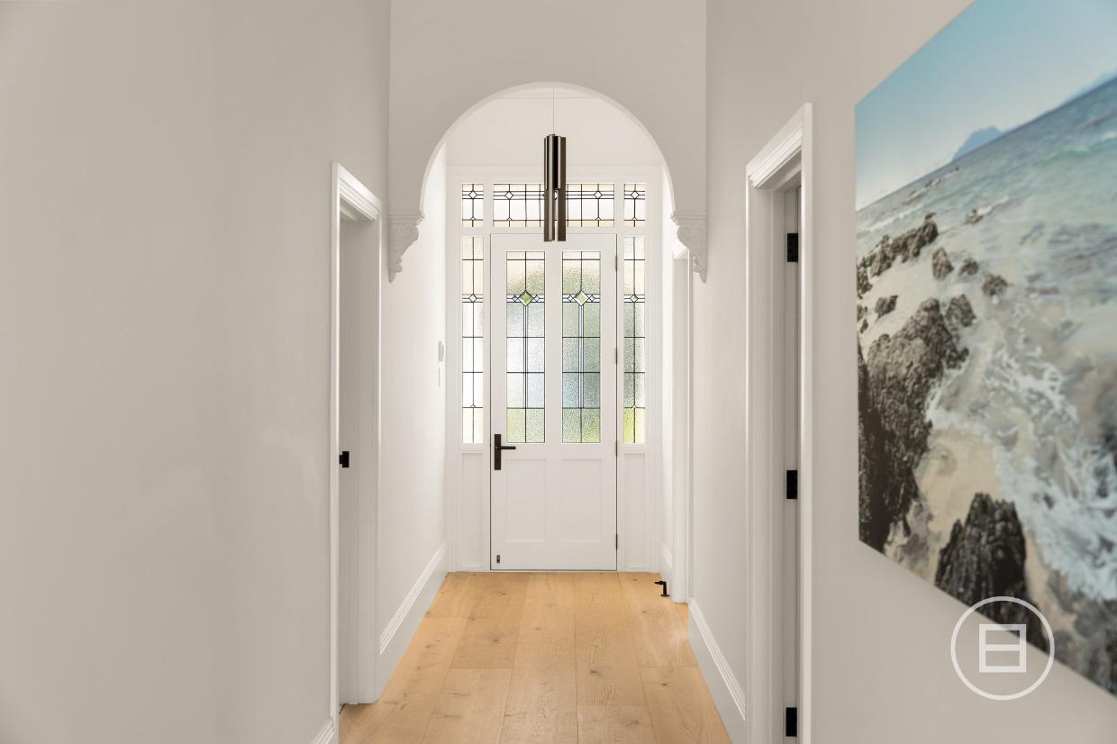 The front door needed to be replaced. The leadlights and stained glass are in keeping with the original.