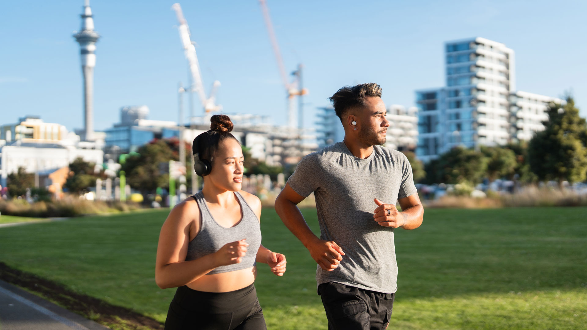 Friends out jogging on a nice day in Auckland, New Zealand.