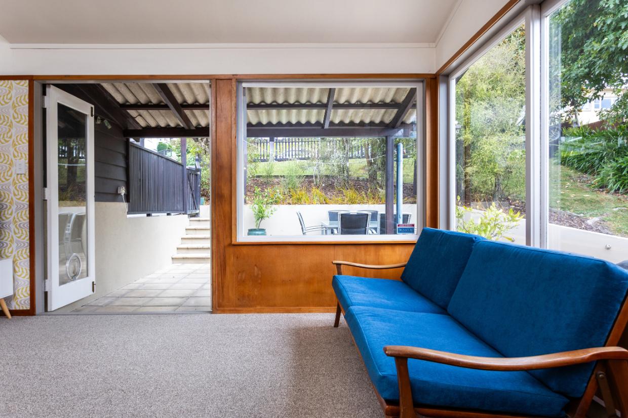 Doors open onto the courtyard, enhancing light and space