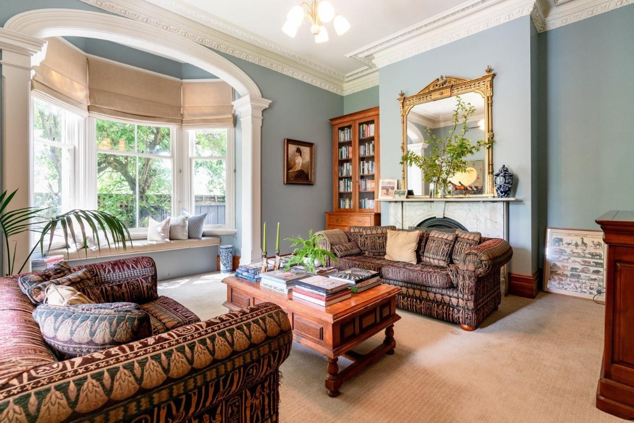 The drawing room showcases some of the home’s finest period features.