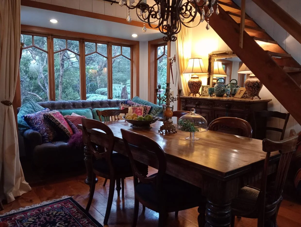 The cottage has lots of lovely detail, including this geometric window framing. 