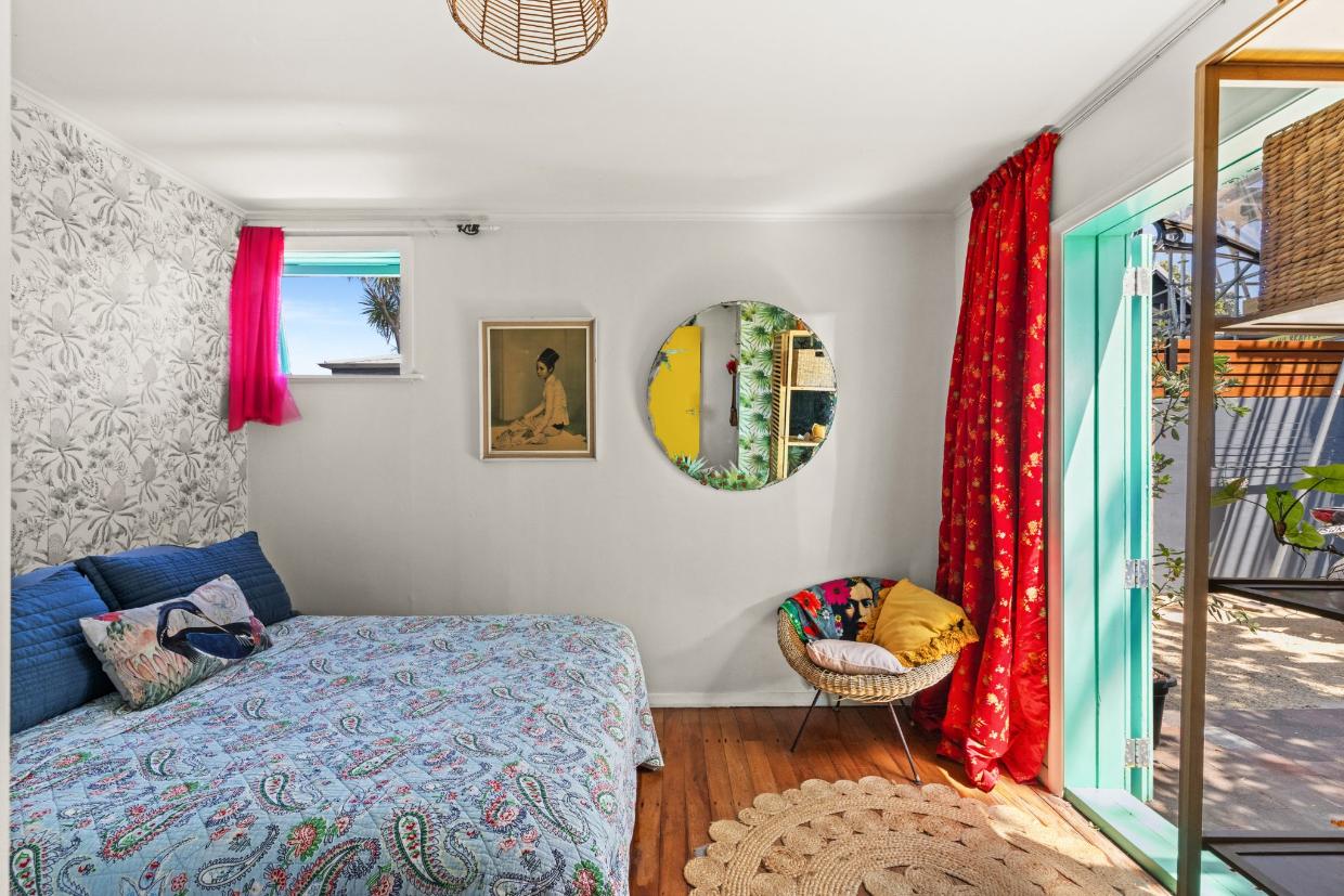 The bedroom opens onto the courtyard