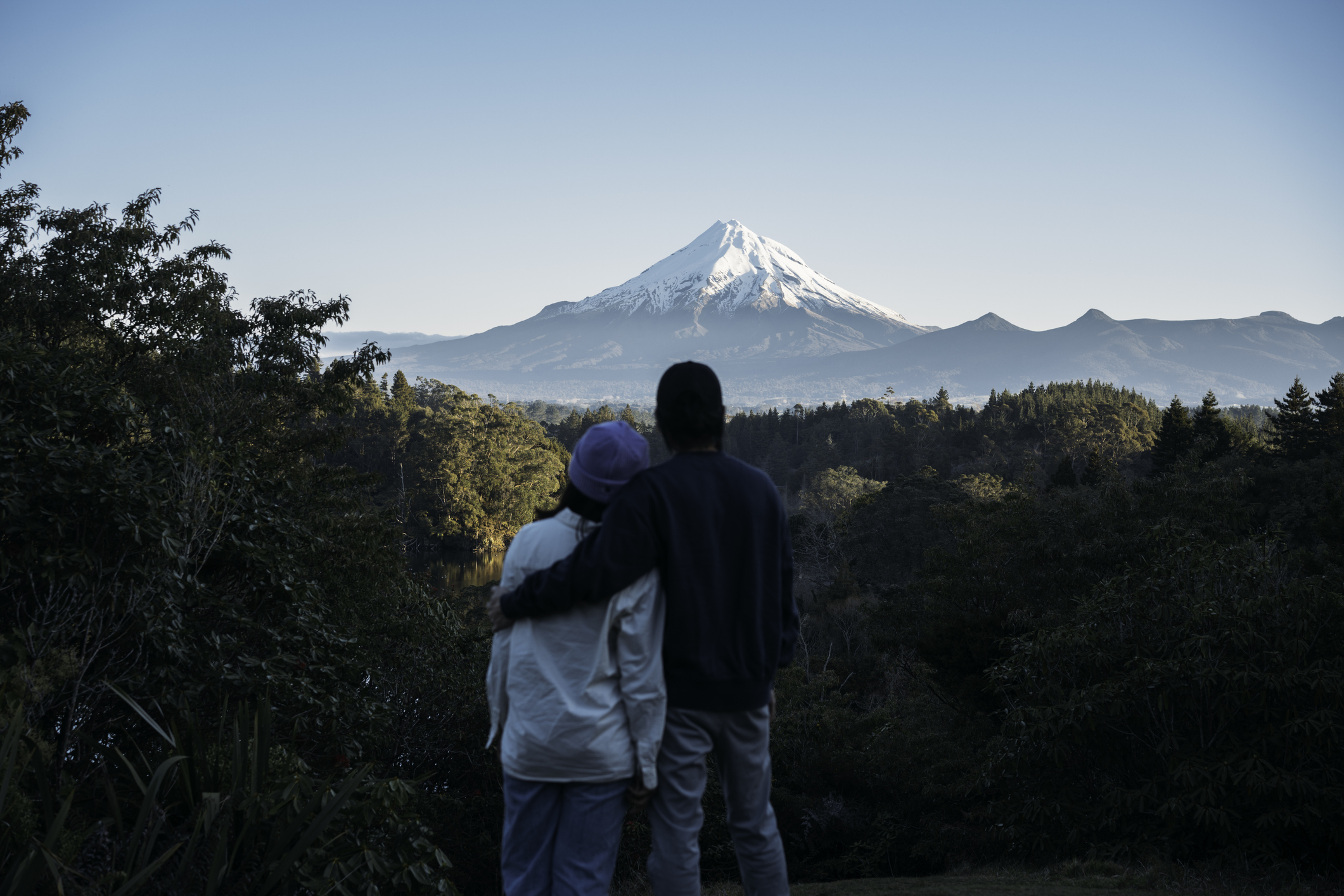 Couple looking at Mt Taranaki