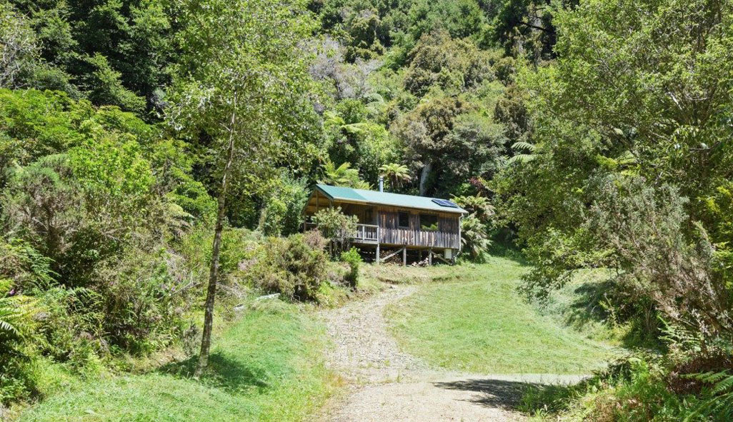 An off-grid property for sale in the Tākaka region of New Zealand.