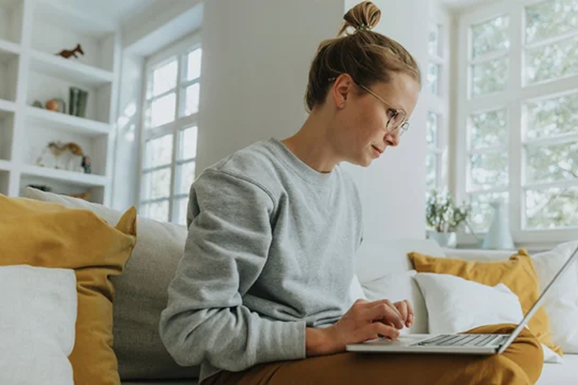 Recruiter checking CVs on laptop