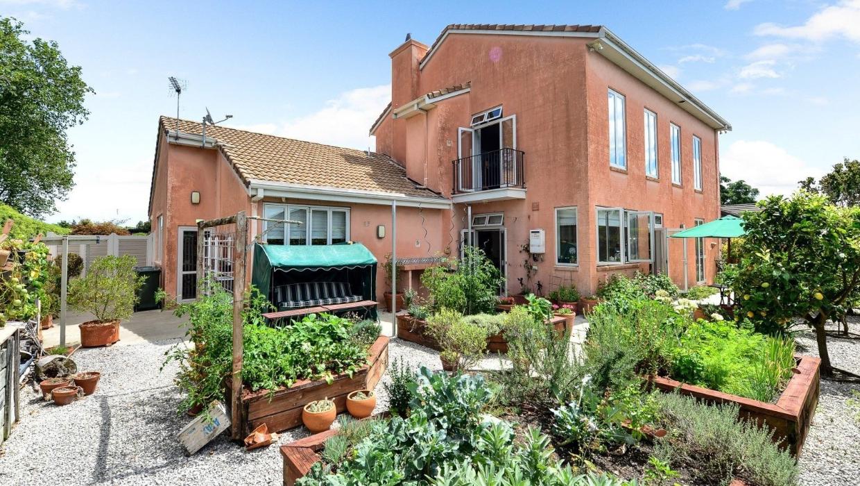 Hamilton home with garden features including vegetable gardens and fruit trees.