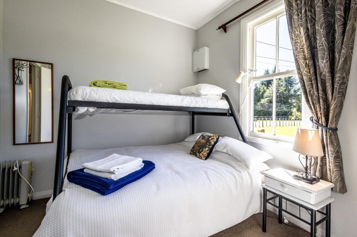 One of the four bedrooms shown. 