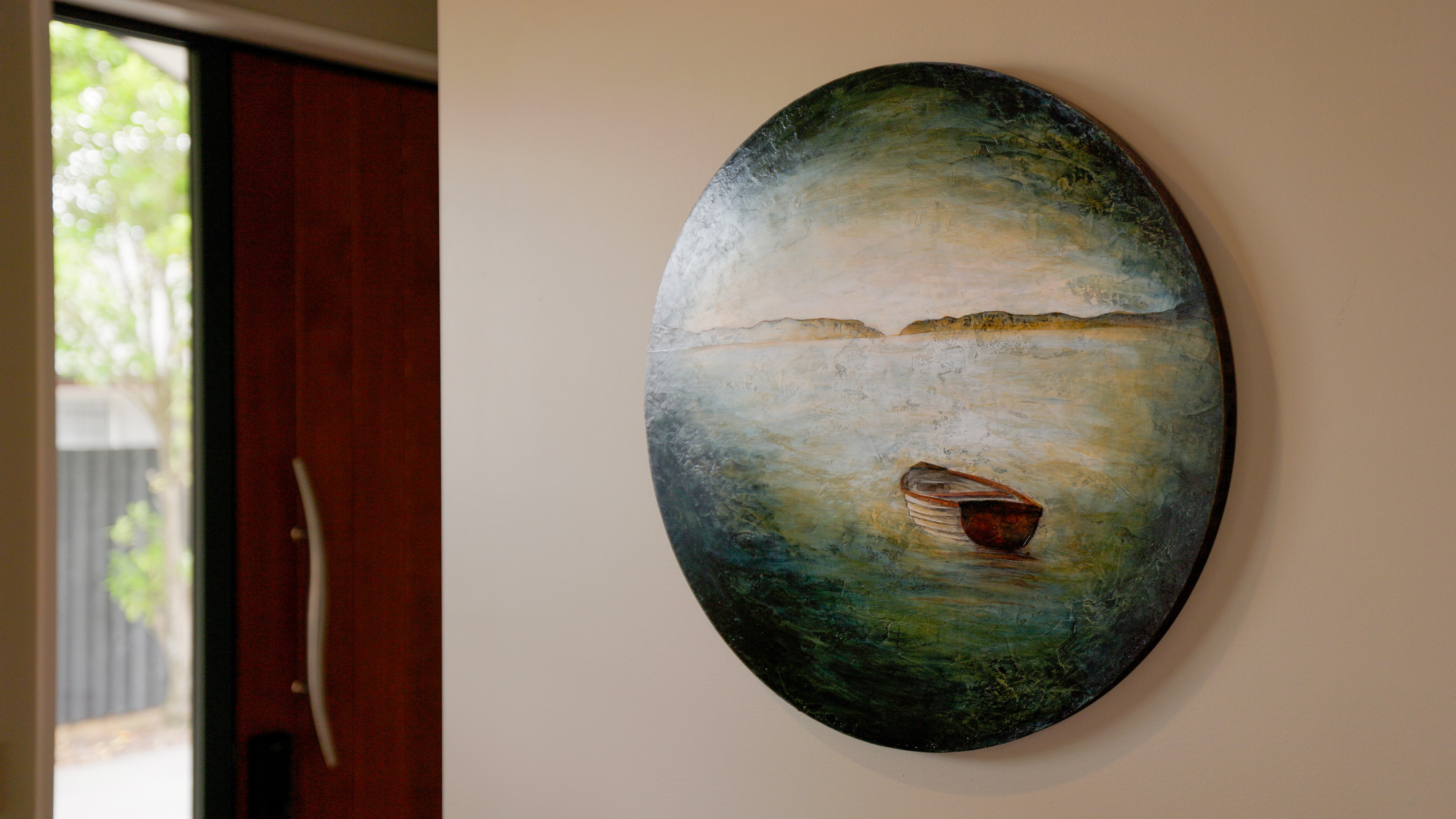 A piece of art on the wall of the home.