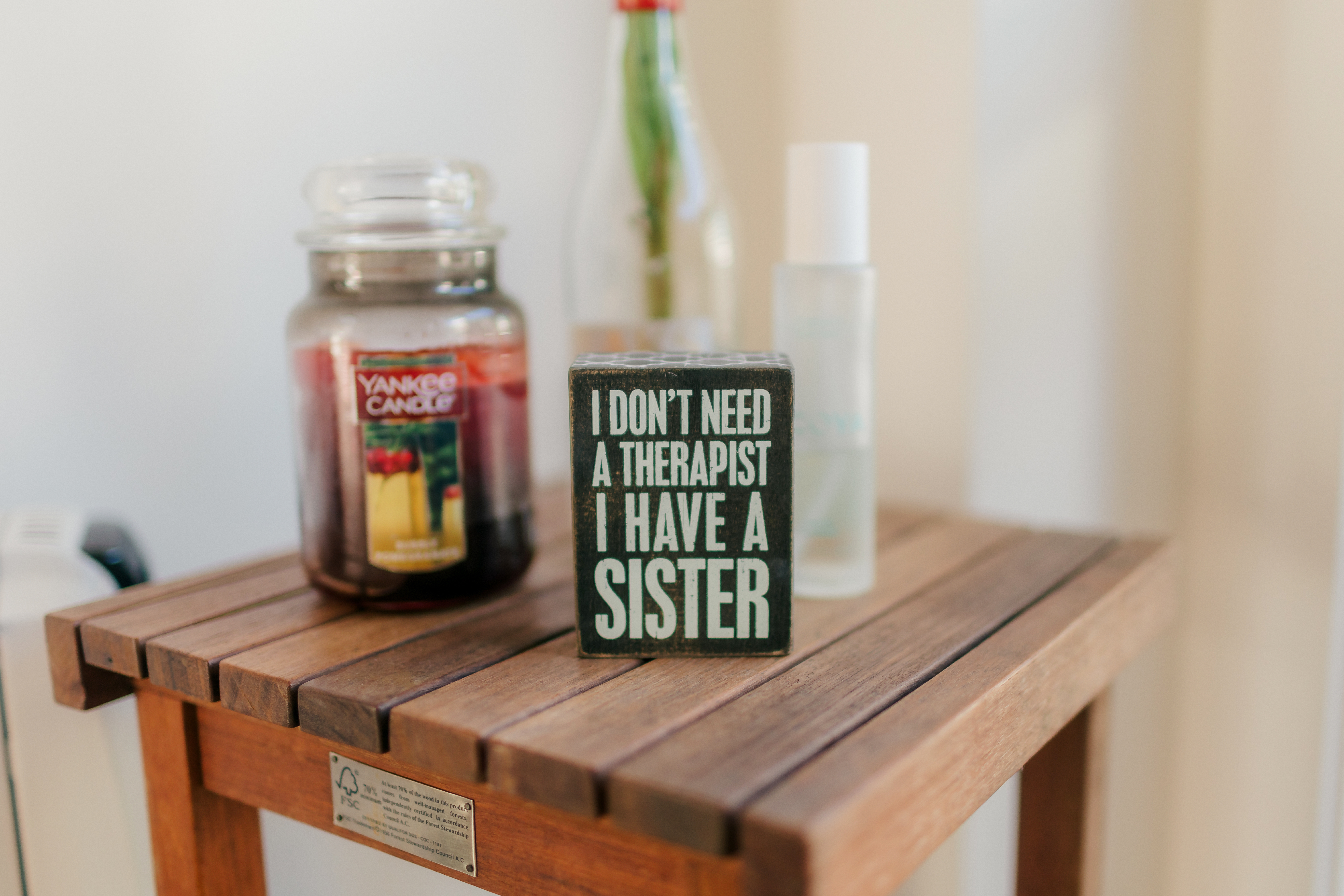 Decorative block that reads "I don't need a therapist I have a sister"