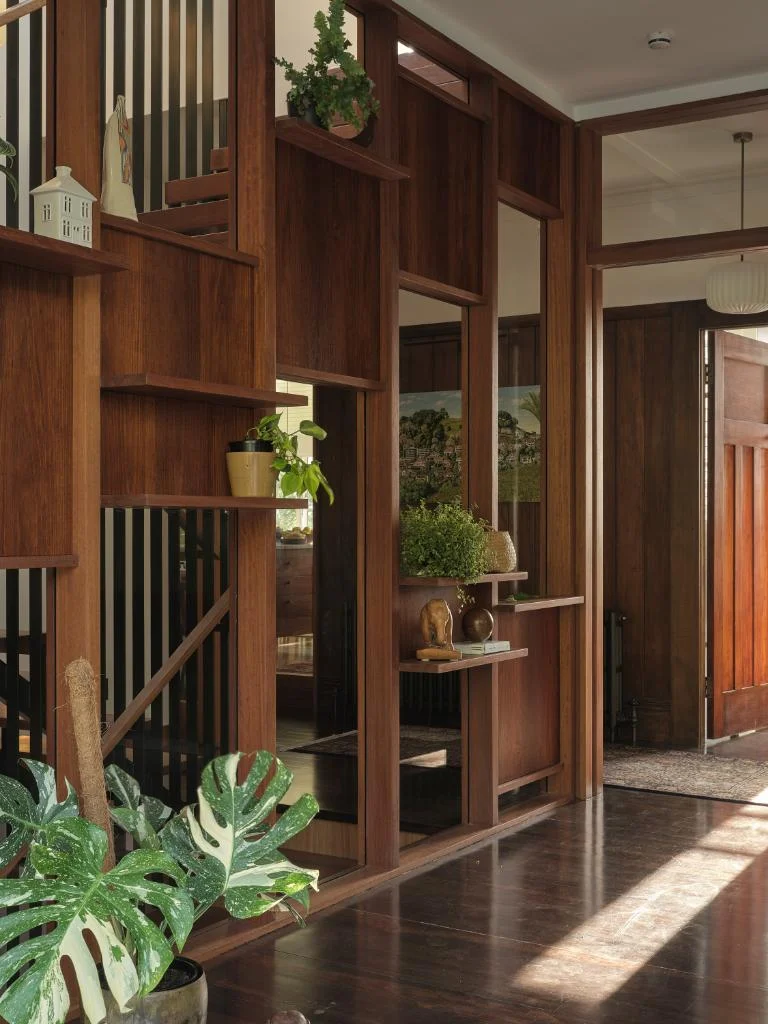 A beautiful timber screen blends effortlessly with the existing timber panelling and doors. Photo: Sm Hartnett
