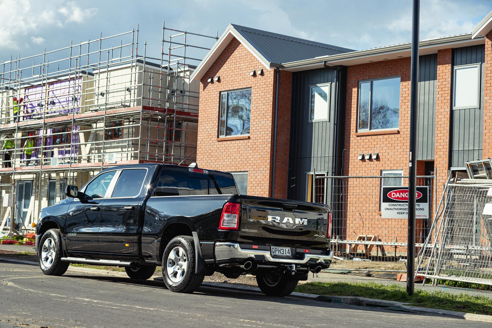 Dodge-Ram-1500-Bighorn-construction-site-rear-quarter