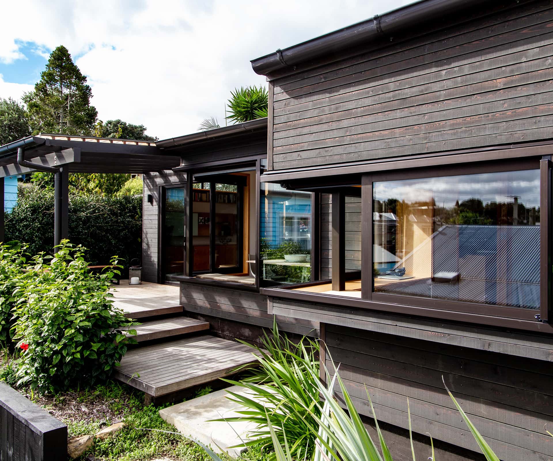 Exterior of the home, surrounded by nature