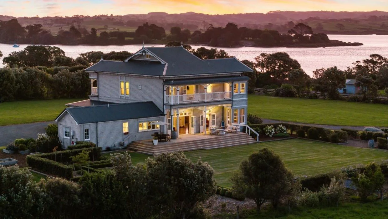 The house is on rolling countryside close to the water. 