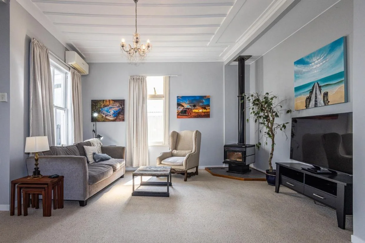 High ceilings and elegant decoration feature in this Kuku St cottage.