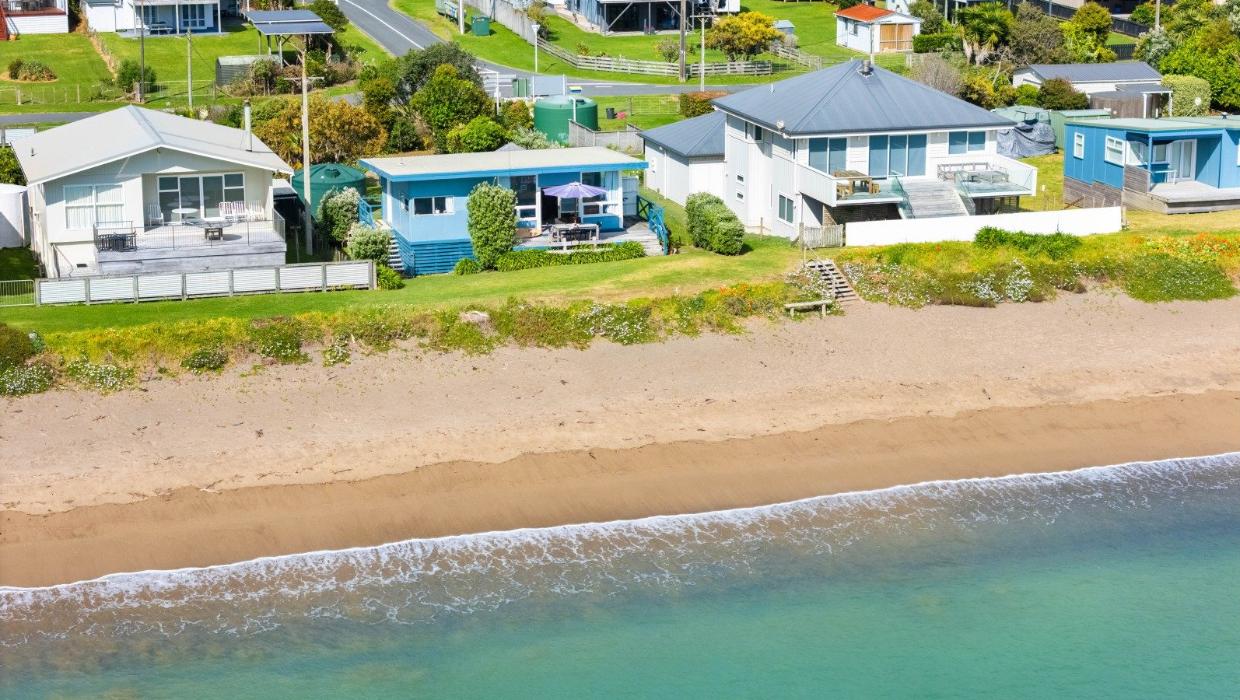 The bach is original, and has an RV of $1.475 million - the value being in the land. Photo: Bayleys