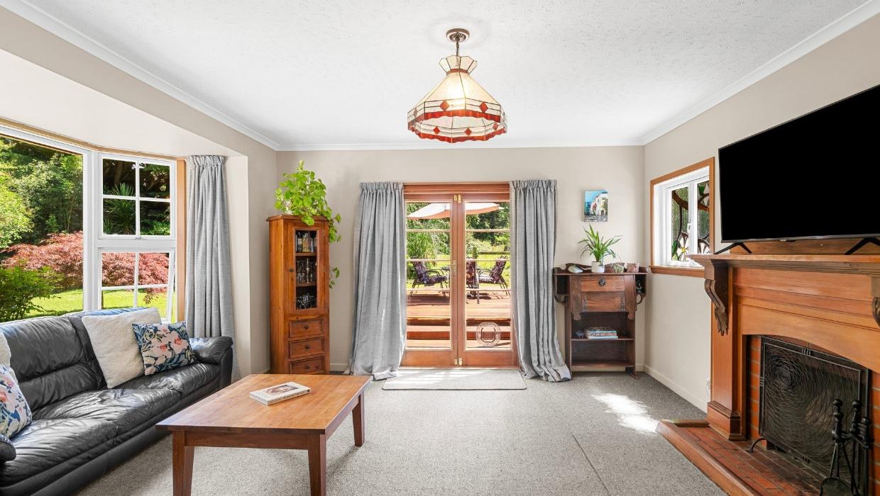 Indoor outdoor flow of red cottage
