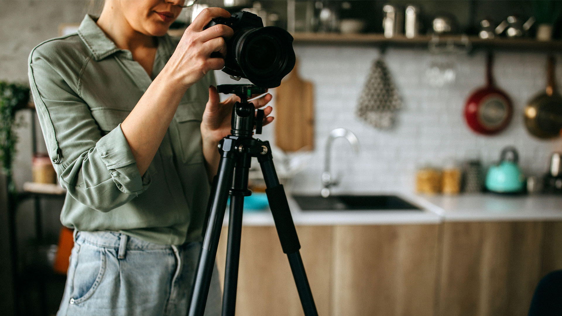 A professional photographer capturing images of a property to help sell it.