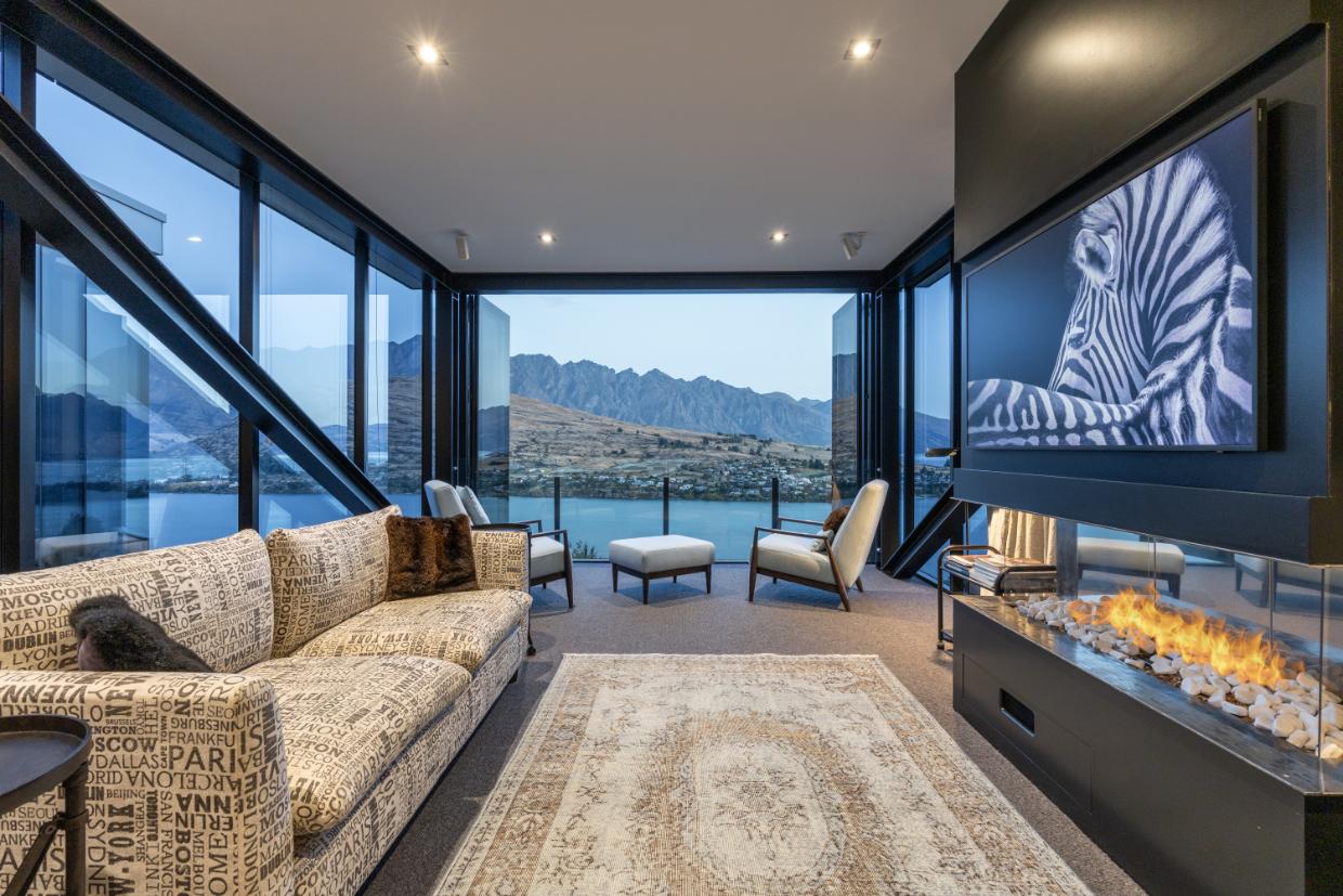 “Inside the black pod is a large, open-plan living space.”