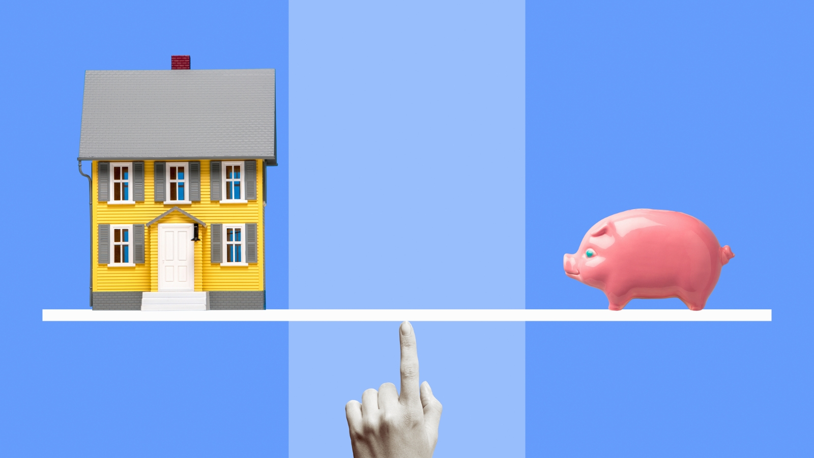 Piggy bank and house balancing. 