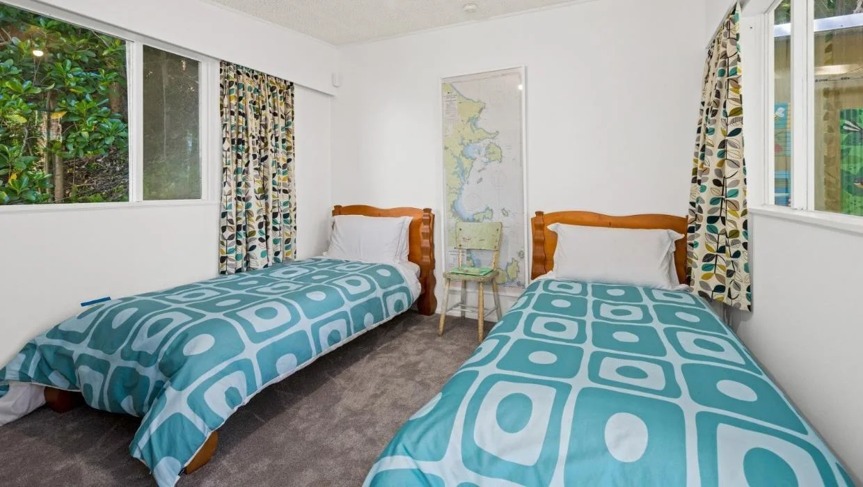 single bedroom at snells beach bach