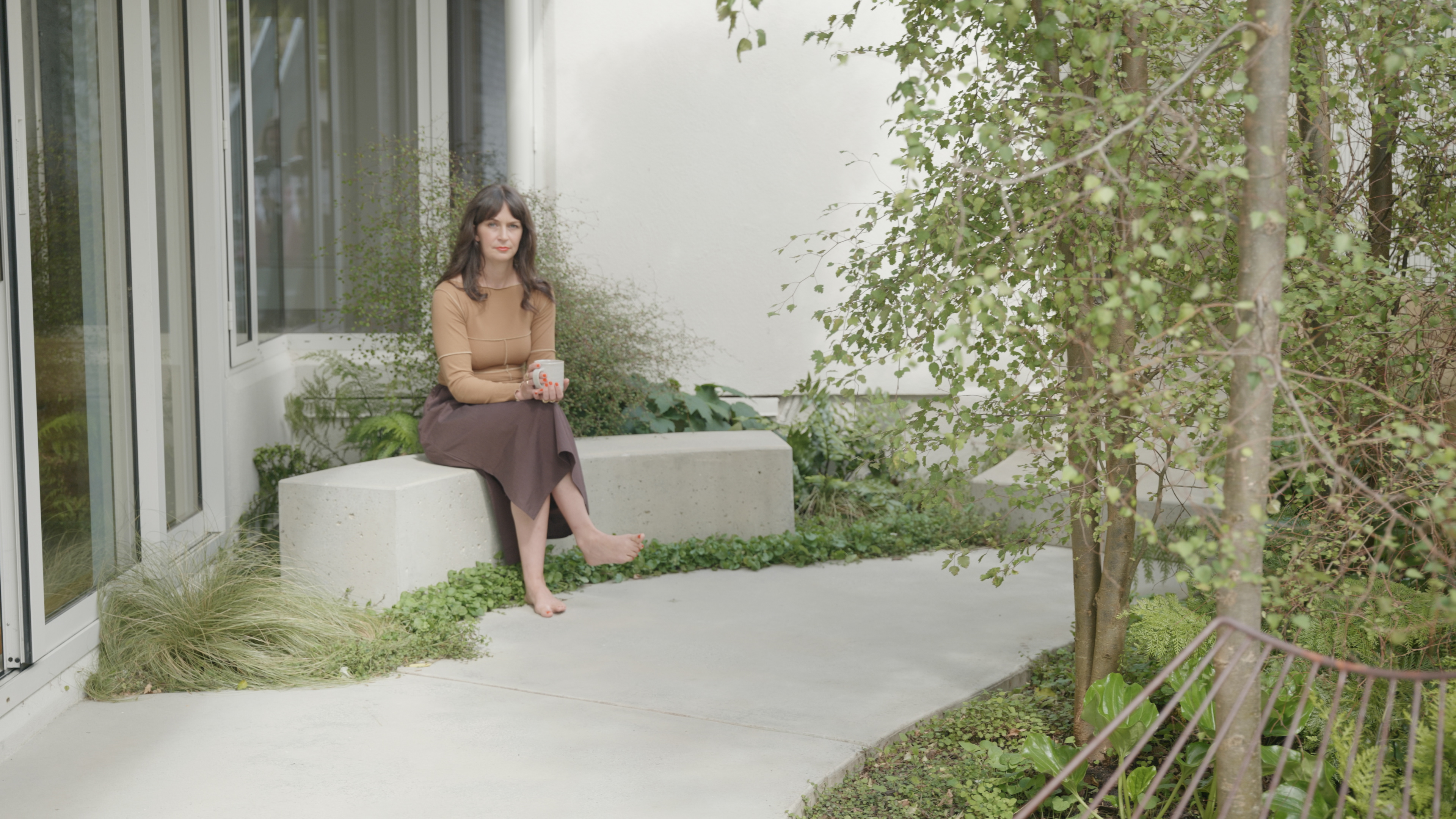 Curved Concrete Bench in the Courtyard