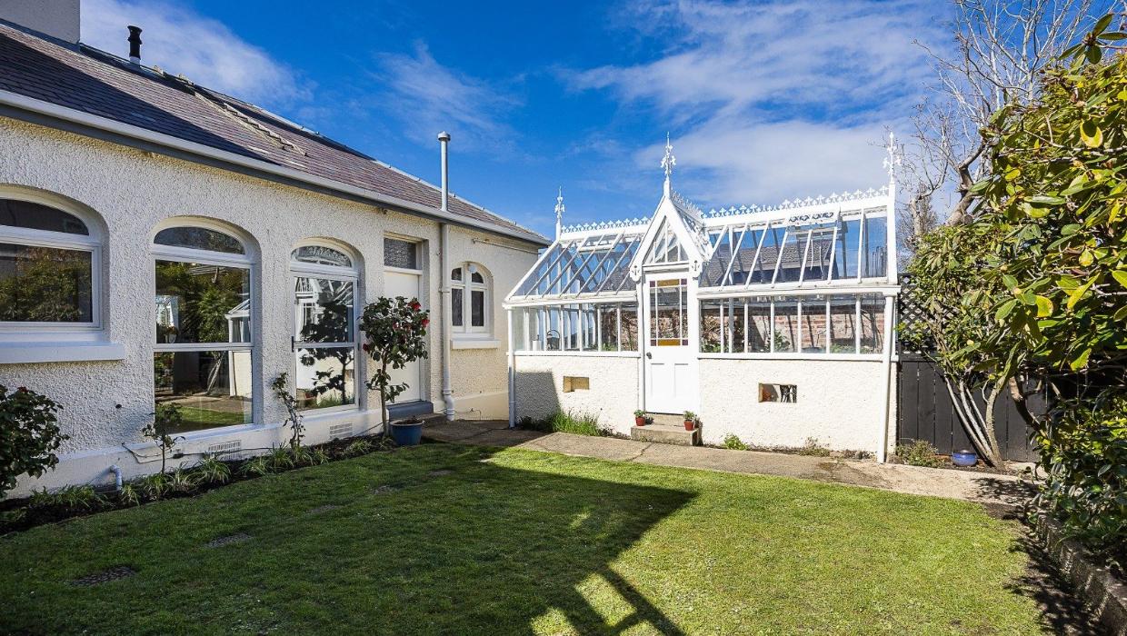 The glasshouse in the garden. Photo: BAYLEYS/TRADE ME